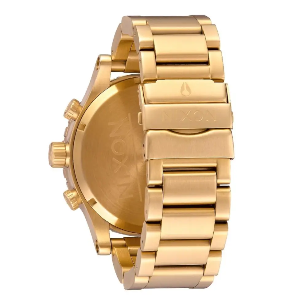 Nixon black sales and gold watch